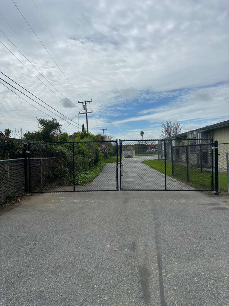 Open chain link fence